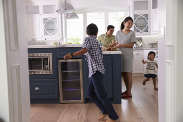 happy family at home in kitchen