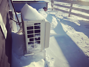 heat pump in the snow